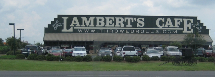 Lambert's Cafe restaurant exterior with parked cars and large 