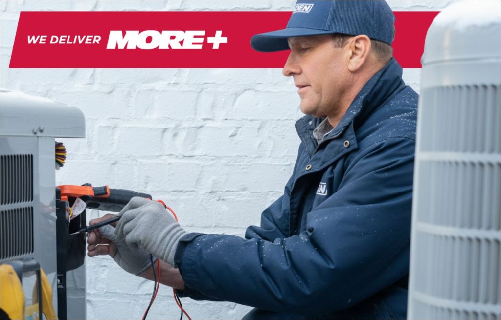 HVAC technician performing maintenance on a heat pump