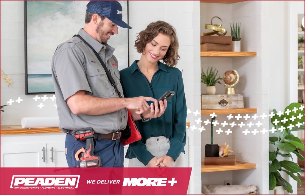 A Peaden HVAC technician explaining the benefits of upgrading.