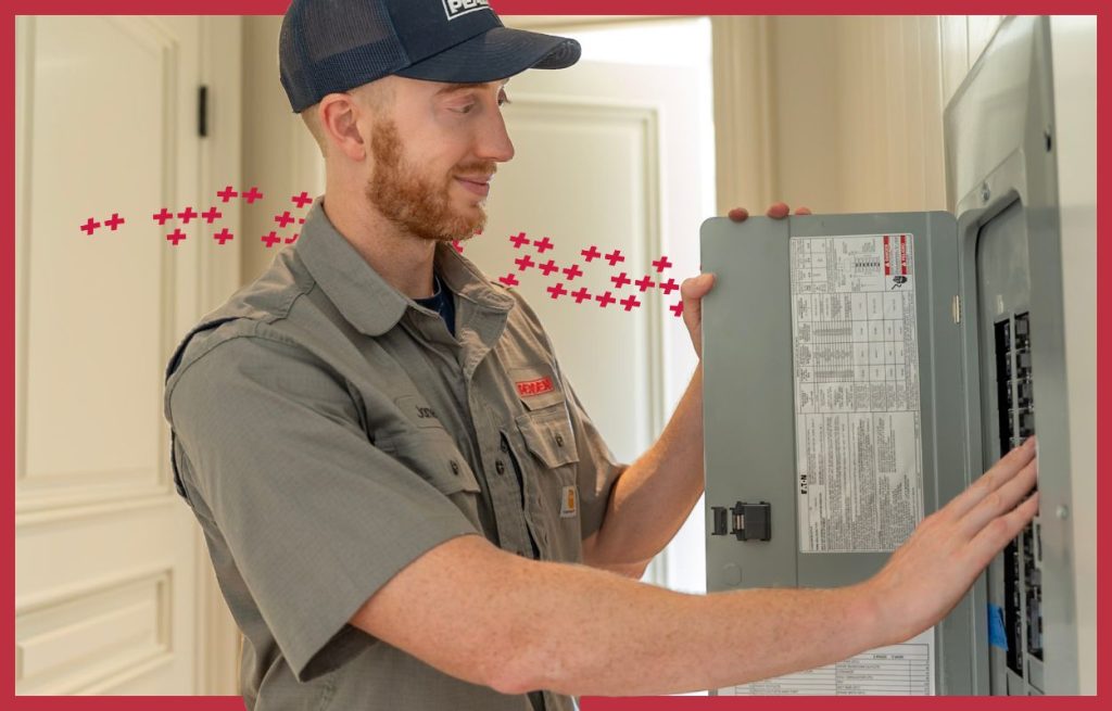 Electrician inspecting an electrical box