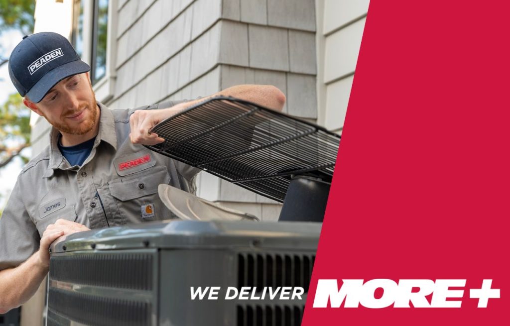 An HVAC tech servicing a heat pump.