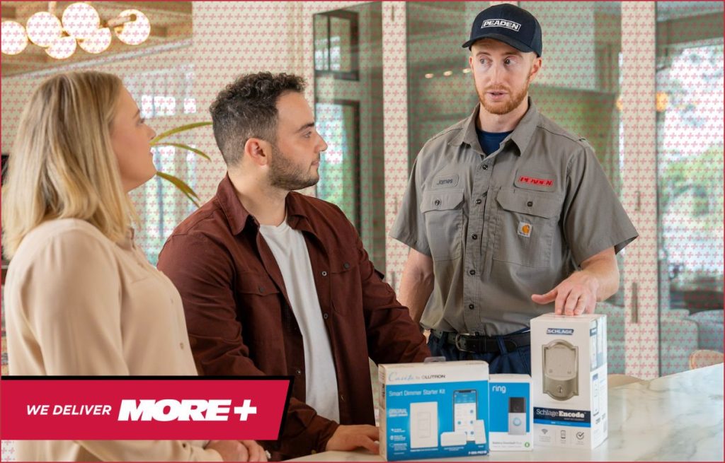 An HVAC technician discussing smart devices