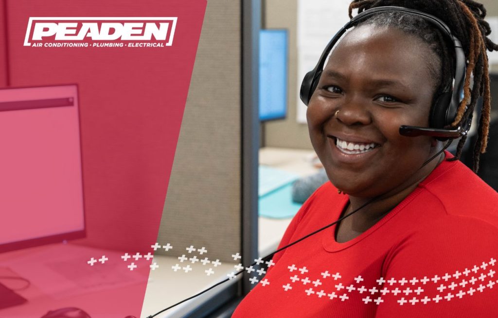 A helpful Peden employee talking to a customer.