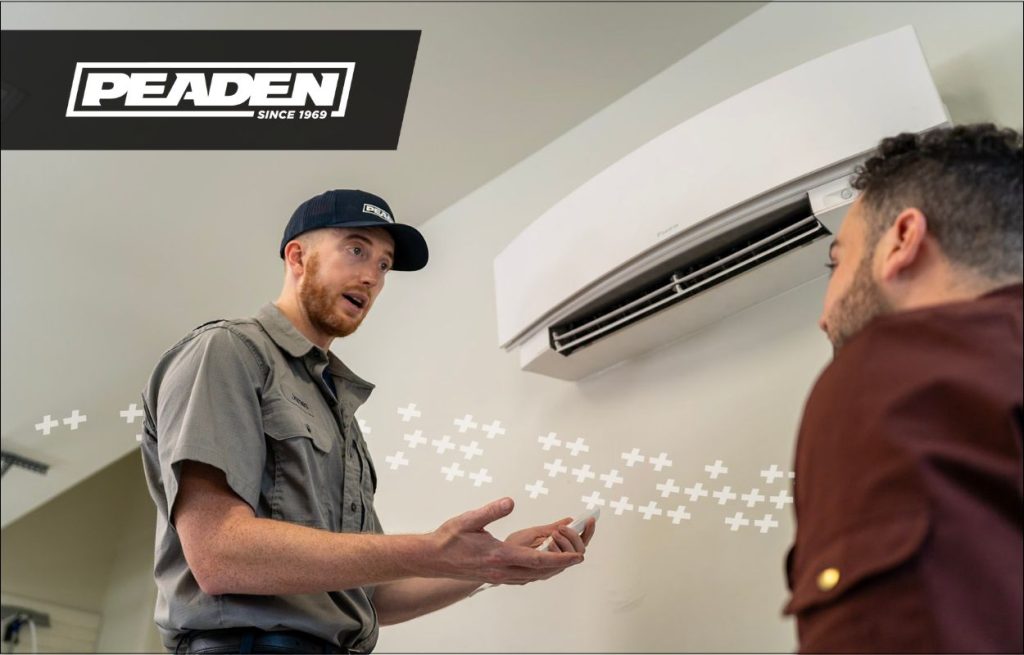 A Peaden HVAC tech discussing minisplits