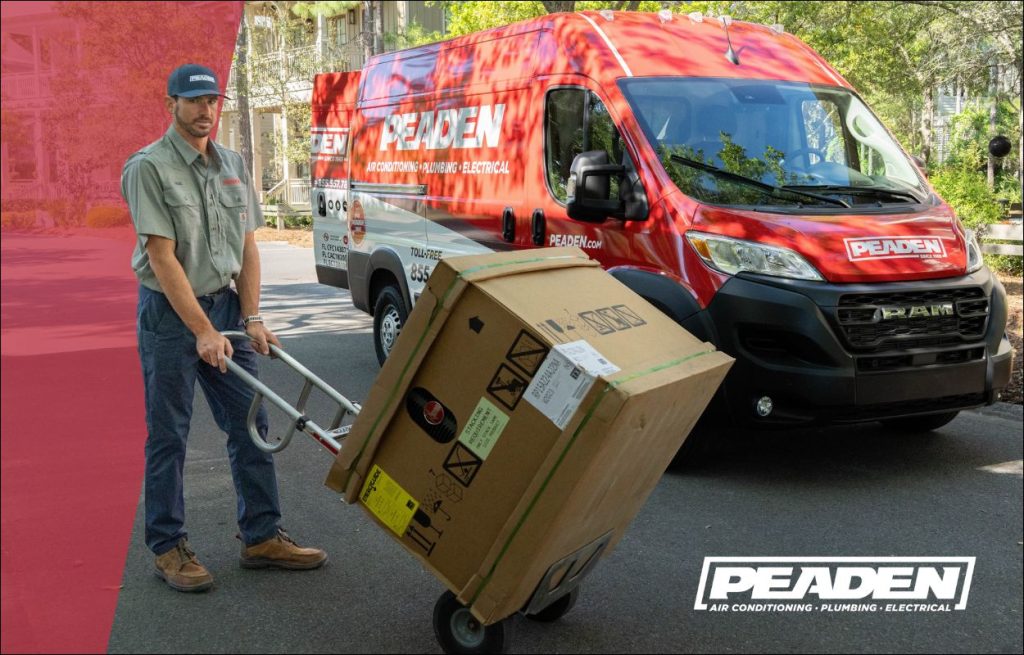 A Peaden HVAC tech delivering a new heat pump.