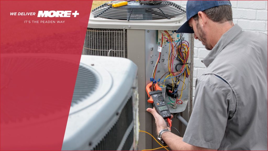 A Peaden HVAC tech working on ac unit.
