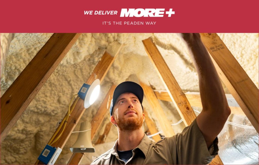 A Peaden HVAC tech checking an attic for a attic fan location.