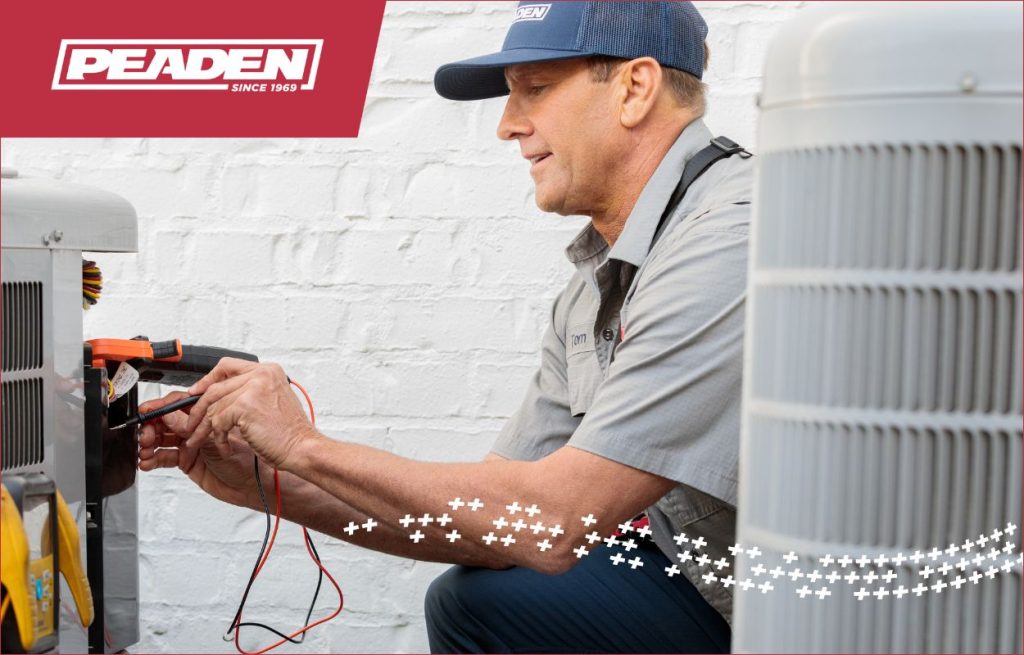 A Peaden HVAC tech diagnosing an AC issue.