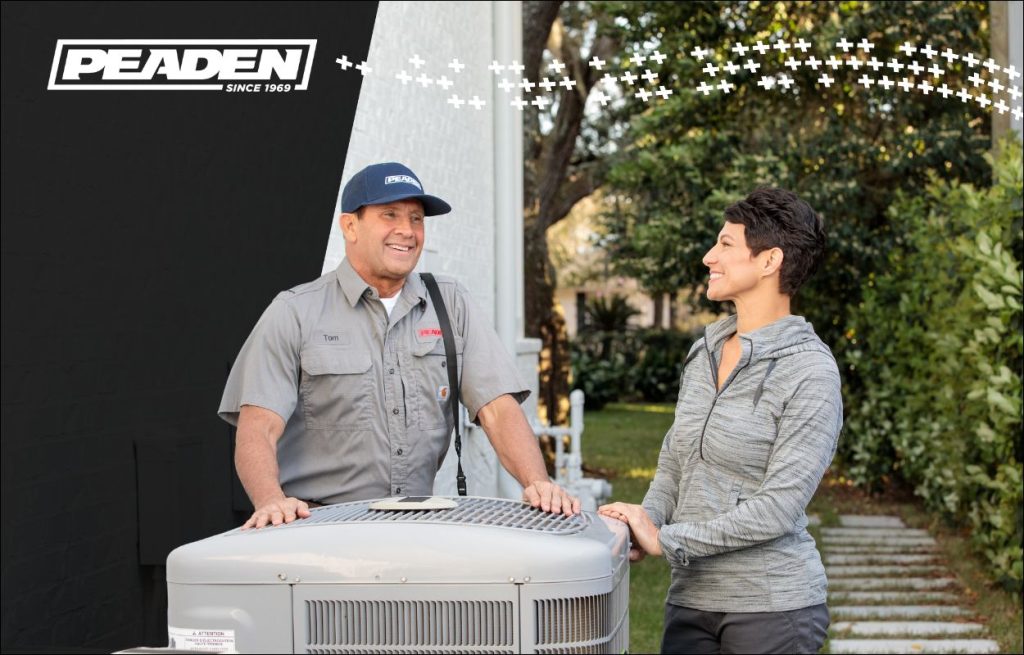 A Peaden HVAC tech explaining AC maintenance.