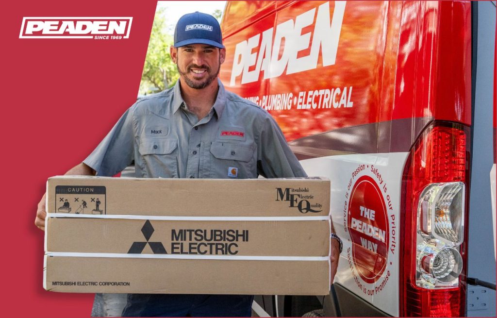 A Peaden HVAC tech delivering a MiniSplit