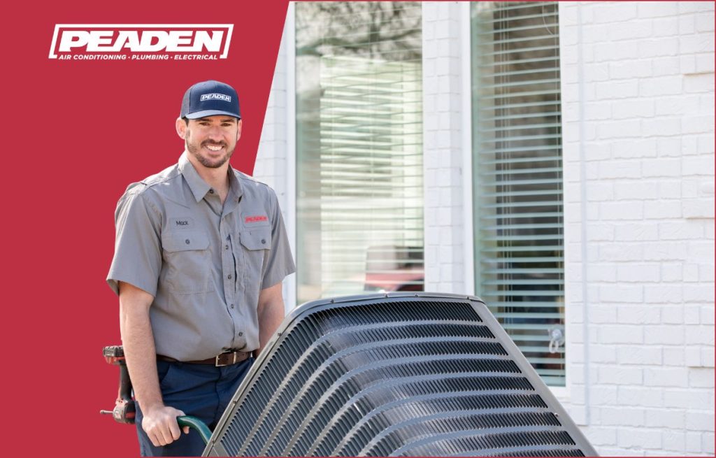 An HVAC tech delivering a new AC unit.