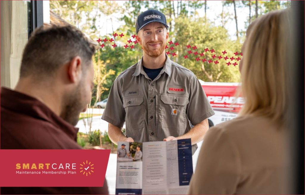 A Peaden HVAC tech discussing Smart Care