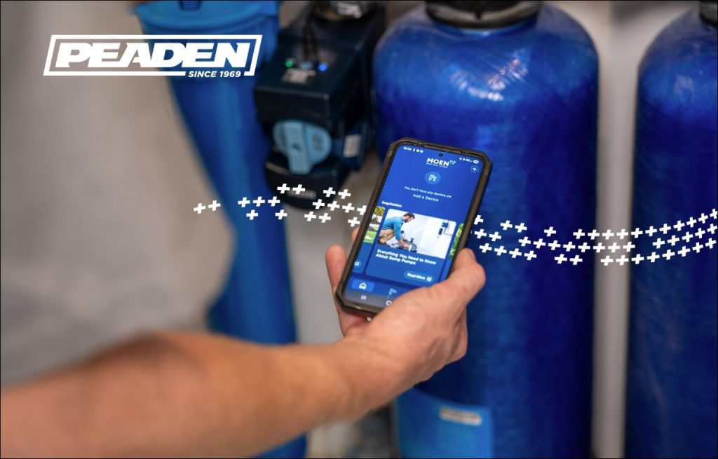 A Peaden plumber calibrating a water filter