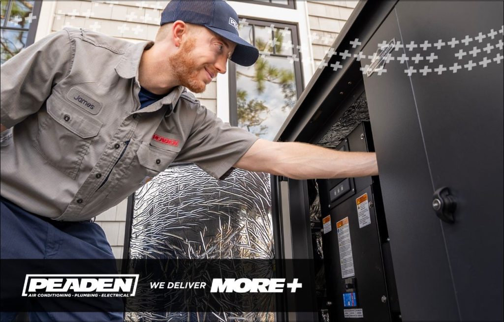 A Peaden Electrician working on a generator