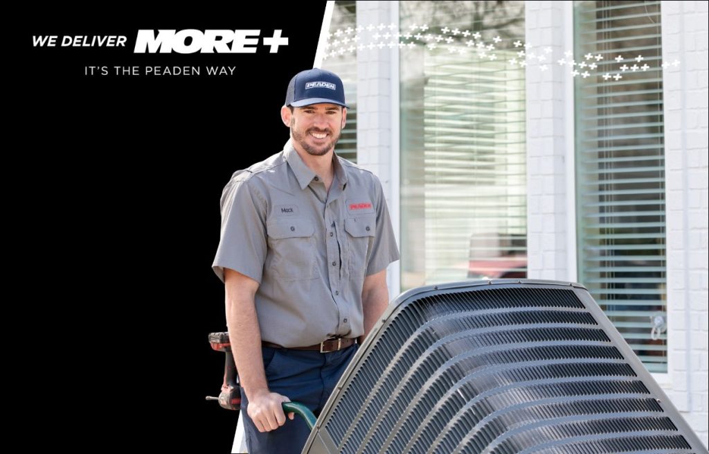 A Peaden HVAC tech delivering a heat pump.