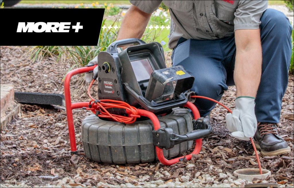 A Peaden plumber using a drain camera.