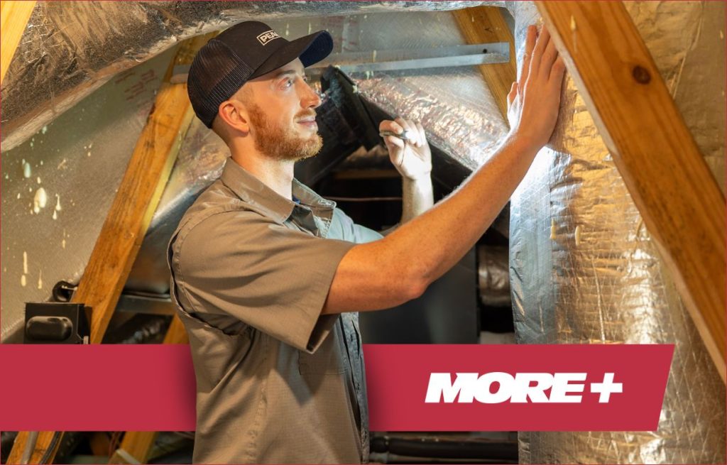 A Peaden HVAC tech inspecting ductwork