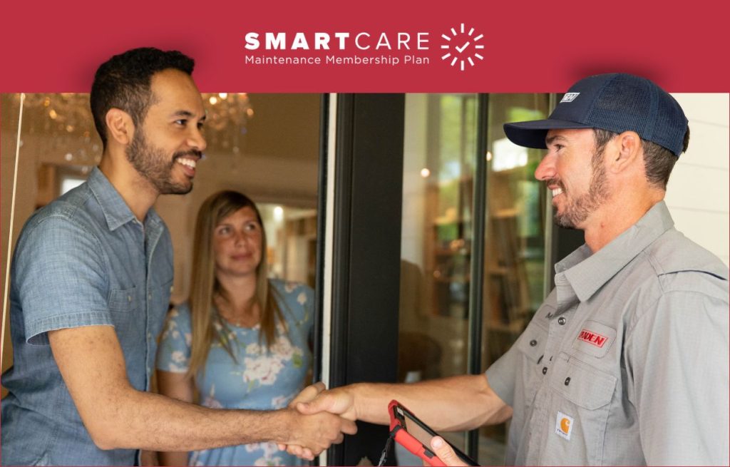 A Peaden HVAC tech shaking hands with a homeowner.