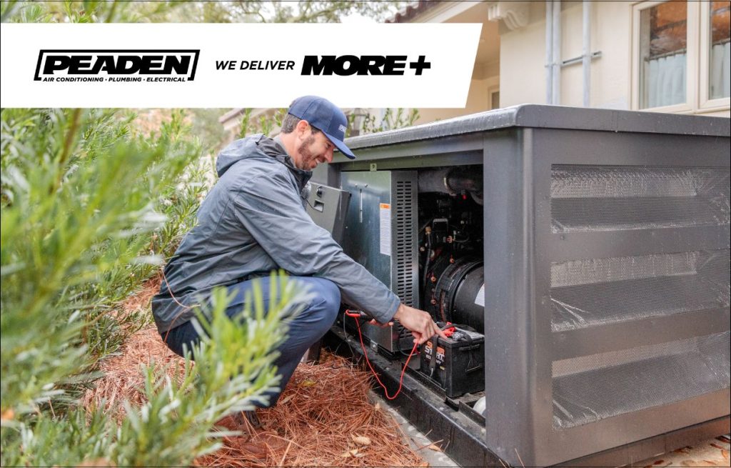 A Peaden Electrician working on a generator