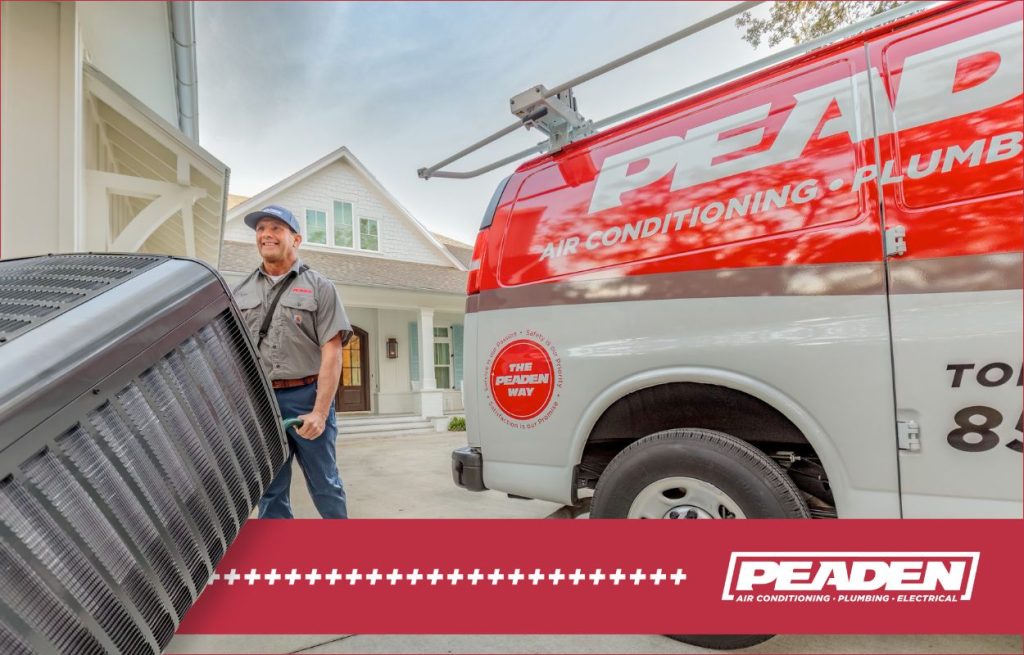 A Peaden HVAC tech delivering a heat pump.