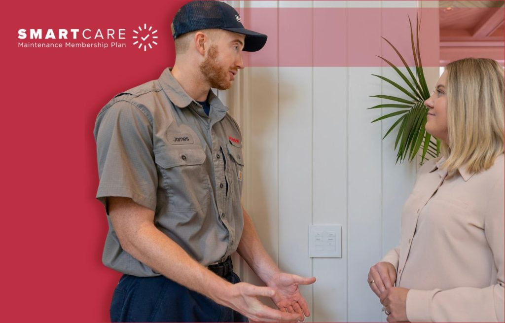 A Peaden HVAC tech explaining SmartCare Club