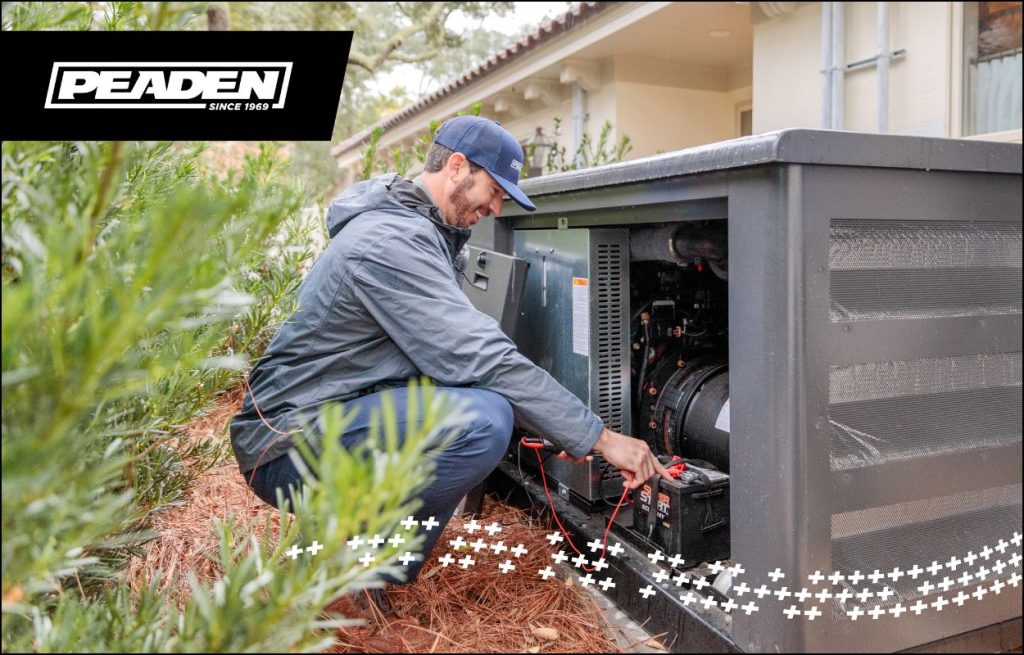 A Peaden Electrician working on a generator