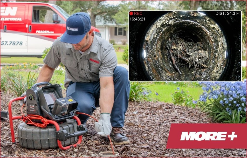 A Peaden plumber using a drain camera.