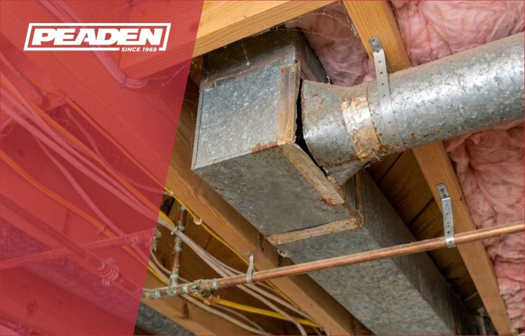 Damaged ductwork in a basement.