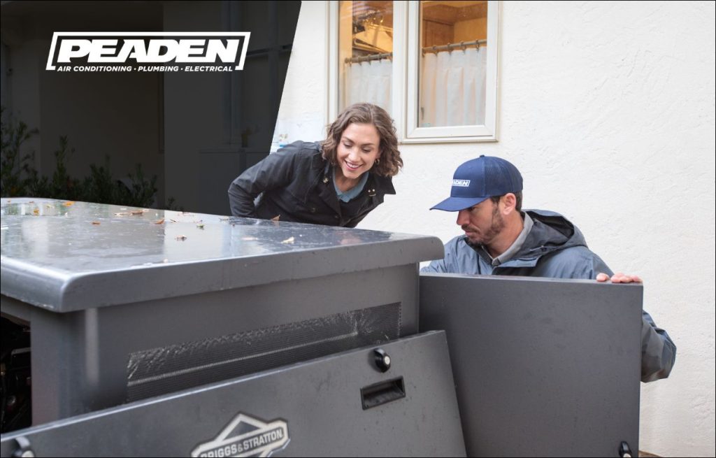 A Peaden Electrician working on a generator