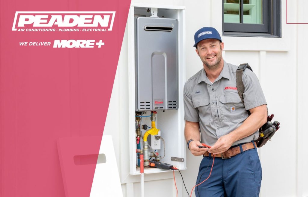 A Peaden plumber installing a tankless water heater.