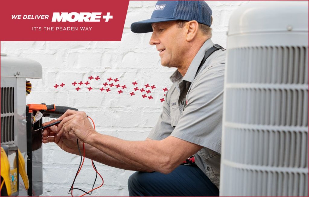 A Peaden HVAC tech working on a ac unit.