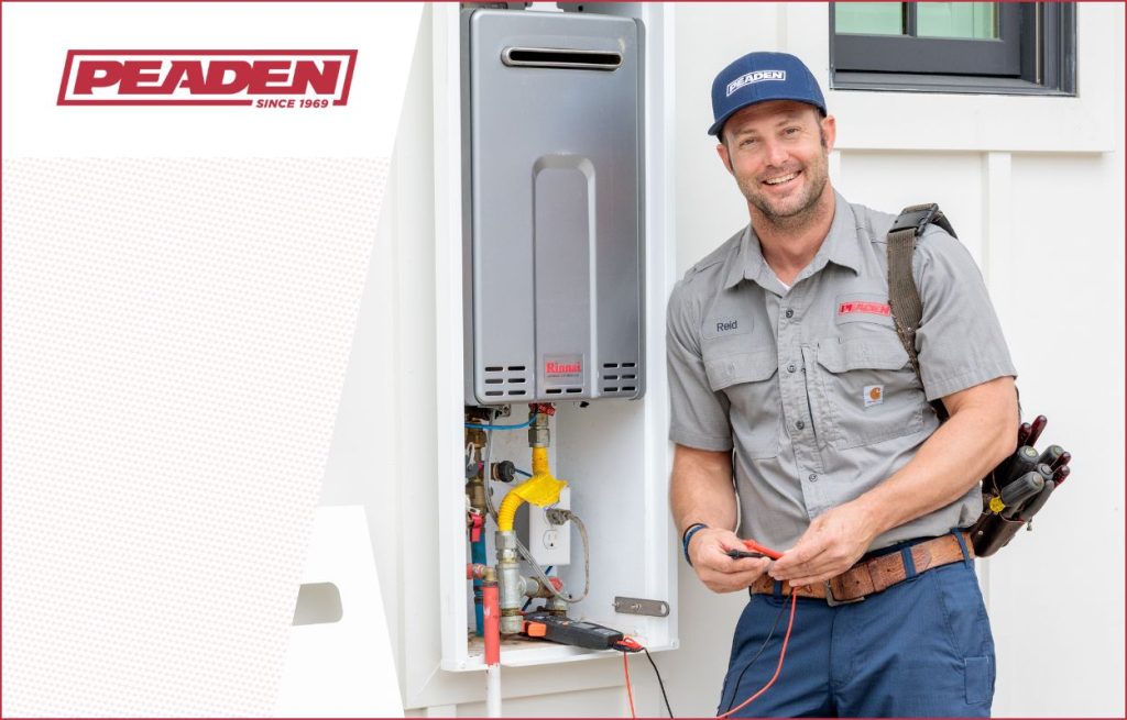 A Peaden plumber installing a tankless water heater.