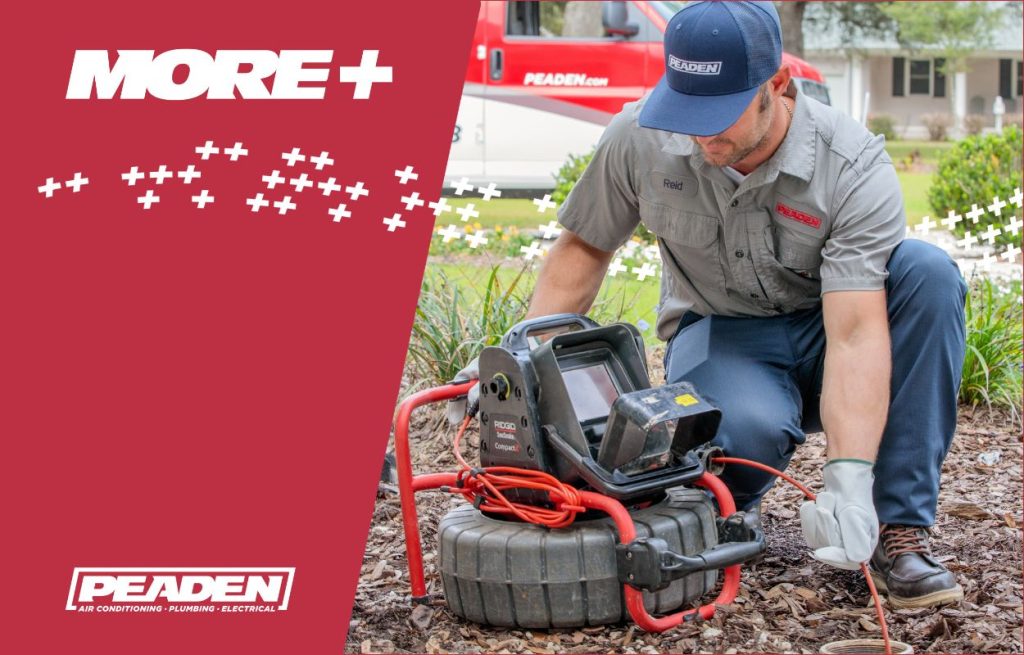 A Peaden plumber using a drain camera.