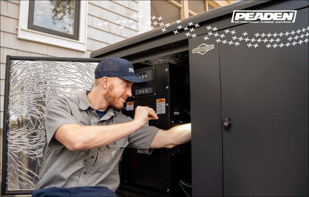 A Peaden Electrician working on a generator