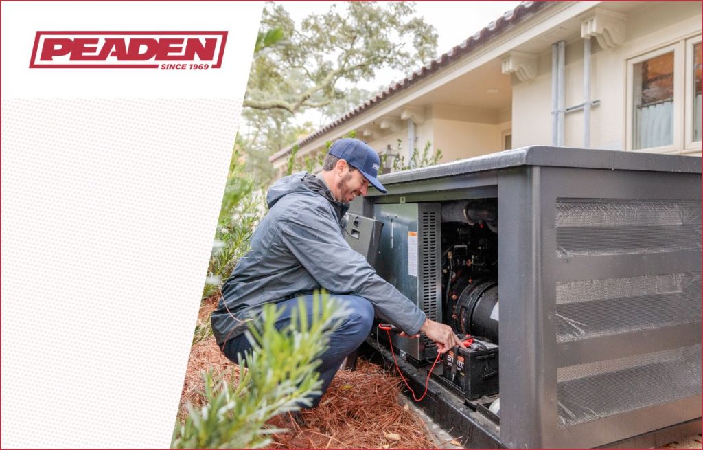 A Peaden Electrician working on a generator