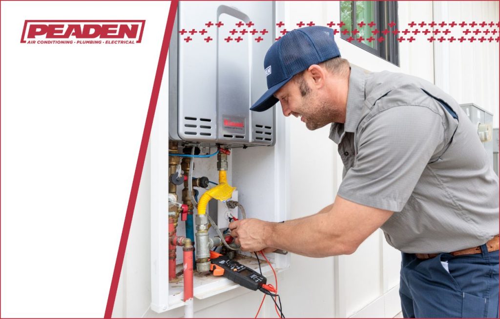 A Peaden plumber installing a tankless water heater.