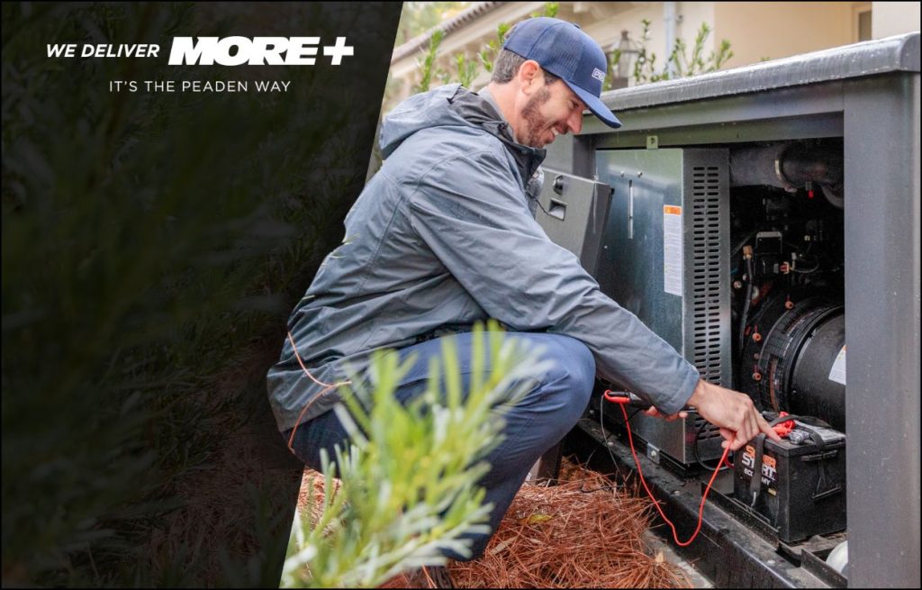 A Peaden Electrician working on a generator