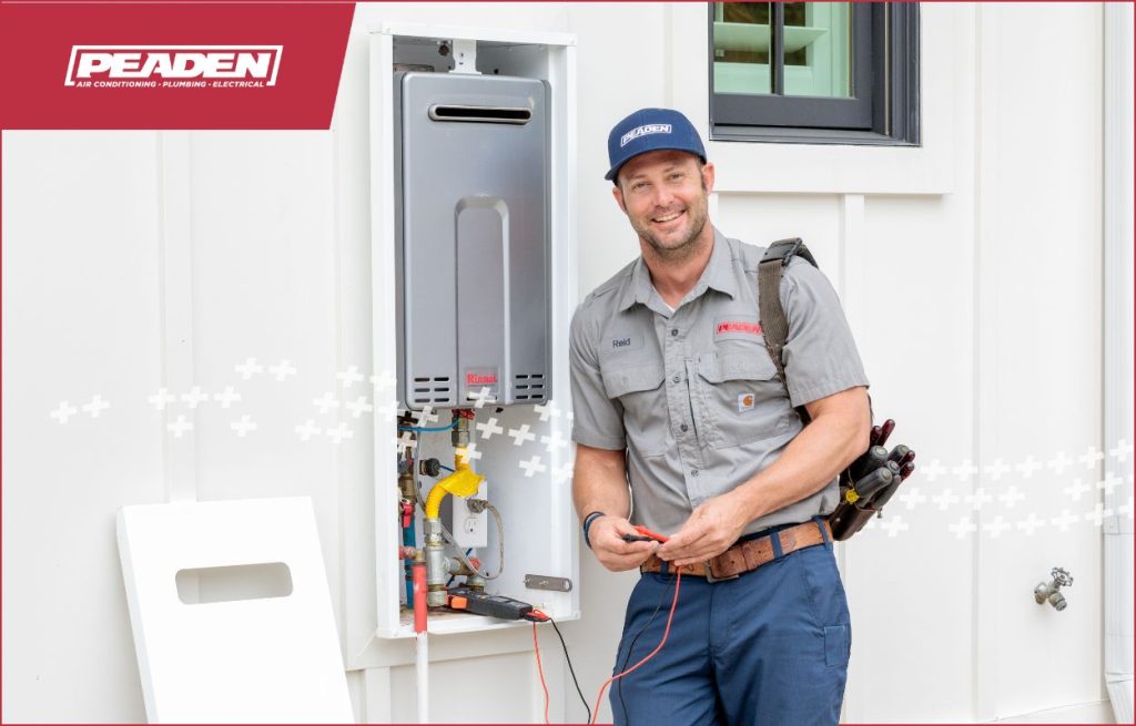 A Peaden plumber installing a tankless water heater.
