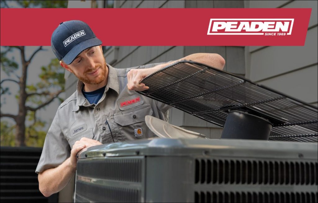 A Peaden Electrician working on a AC unit
