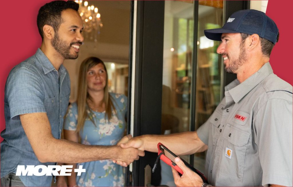 A Peaden tech shaking hands with a homeowner.