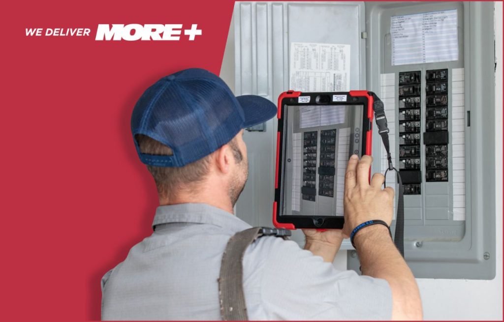 A Peaden Electrician working on a fusebox