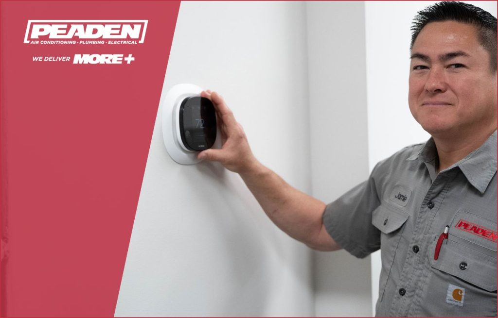 A Peaden HVAC tech showing smart tech.
