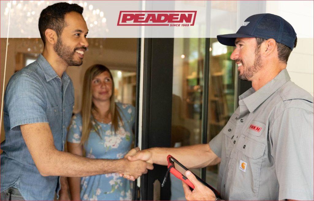 A Peaden HVAC tech shaking hands with the homeowner