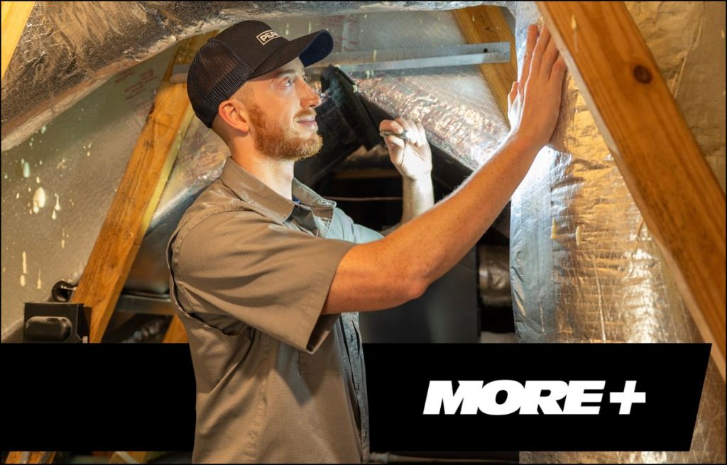 A Peaden HVAC tech inspecting ductwork