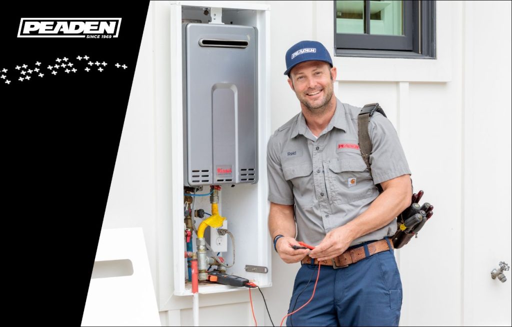 A Peaden plumber installing a tankless water heater.