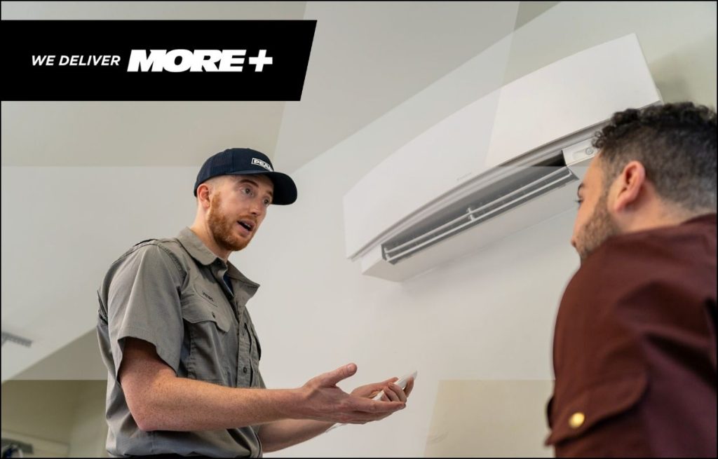 A Peaden HVAC tech discussing a minisplit
