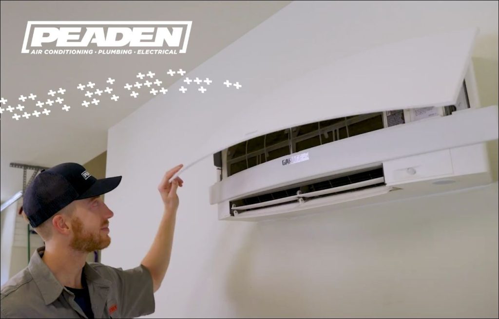 A Peaden HVAC tech installing a mini split.