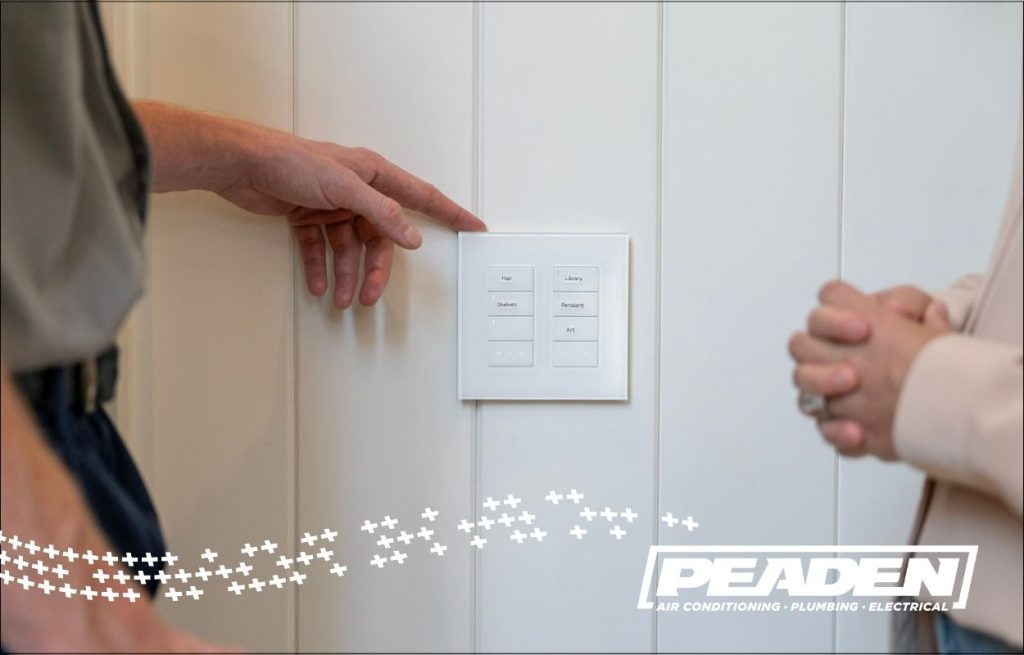 A Peaden Electrician explaining smart light switches