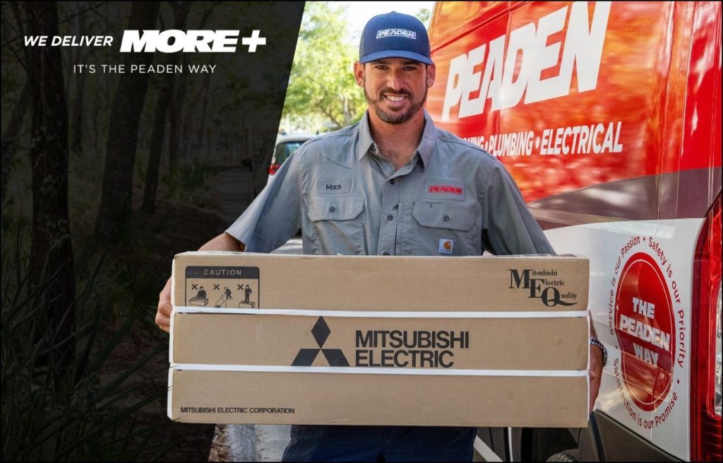 A Peaden HVAC tech delivering a new mini split