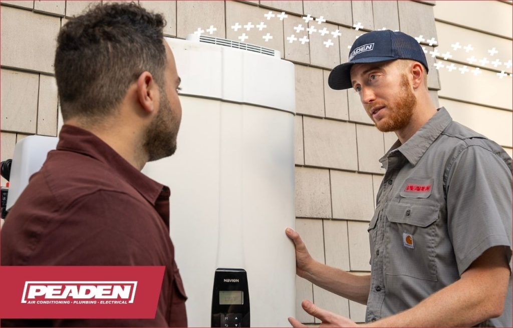 A Peaden plumber discussing water heater issues.